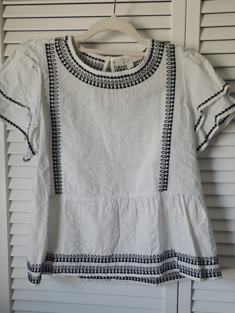 LOFT White Peplum Top with Navy Embroidery
